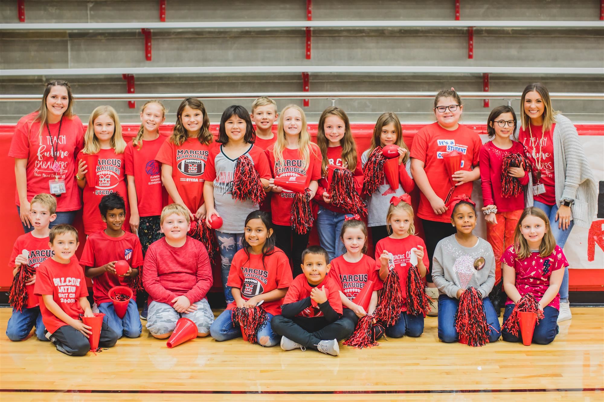 Flower Mound Elementary Falcon Nation Spirit Club group photo after MHS pep rally. 2019 