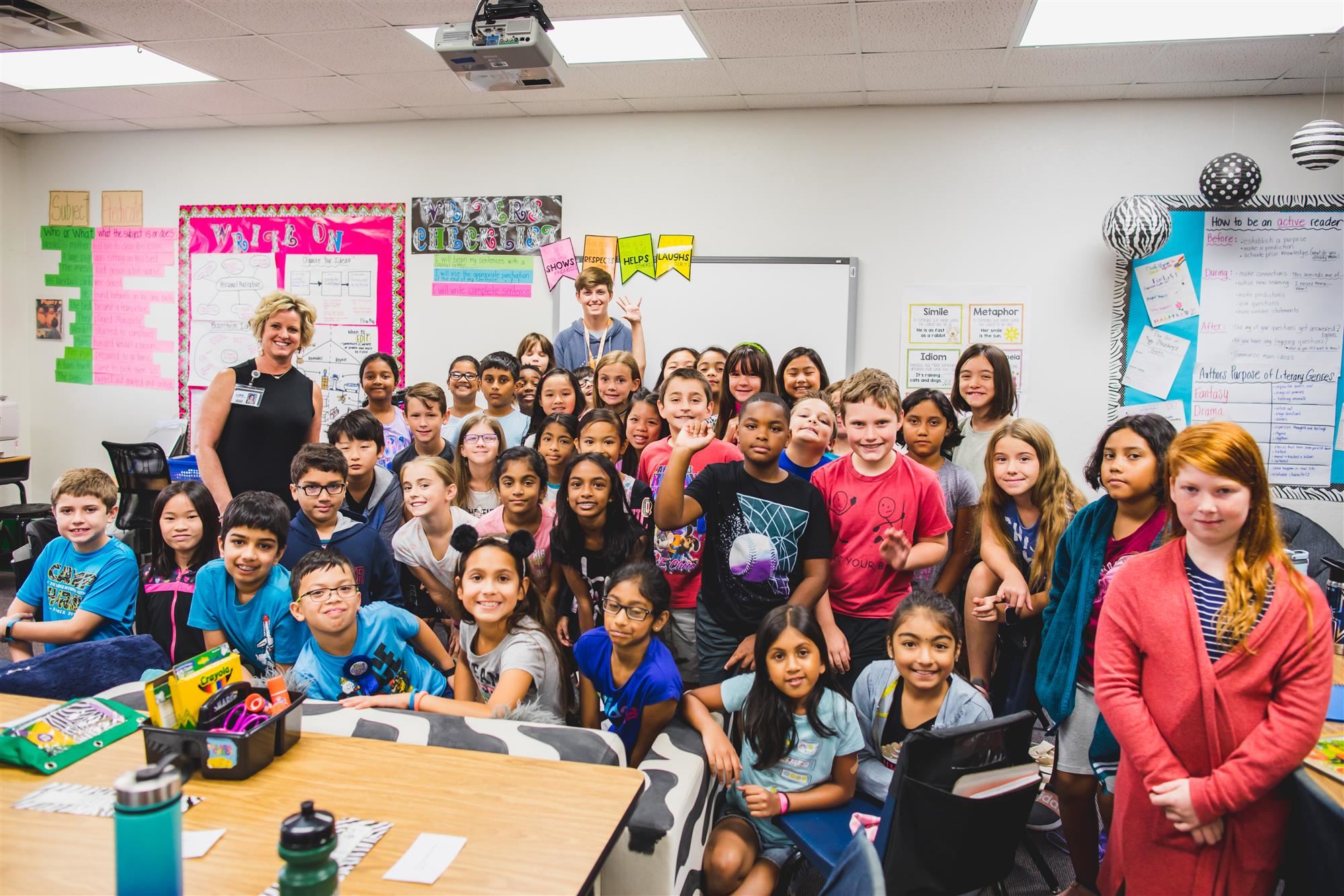 Isaac littleton poses with Bluebonnet Elementary fourth graders in Mrs. Kautz's class.  