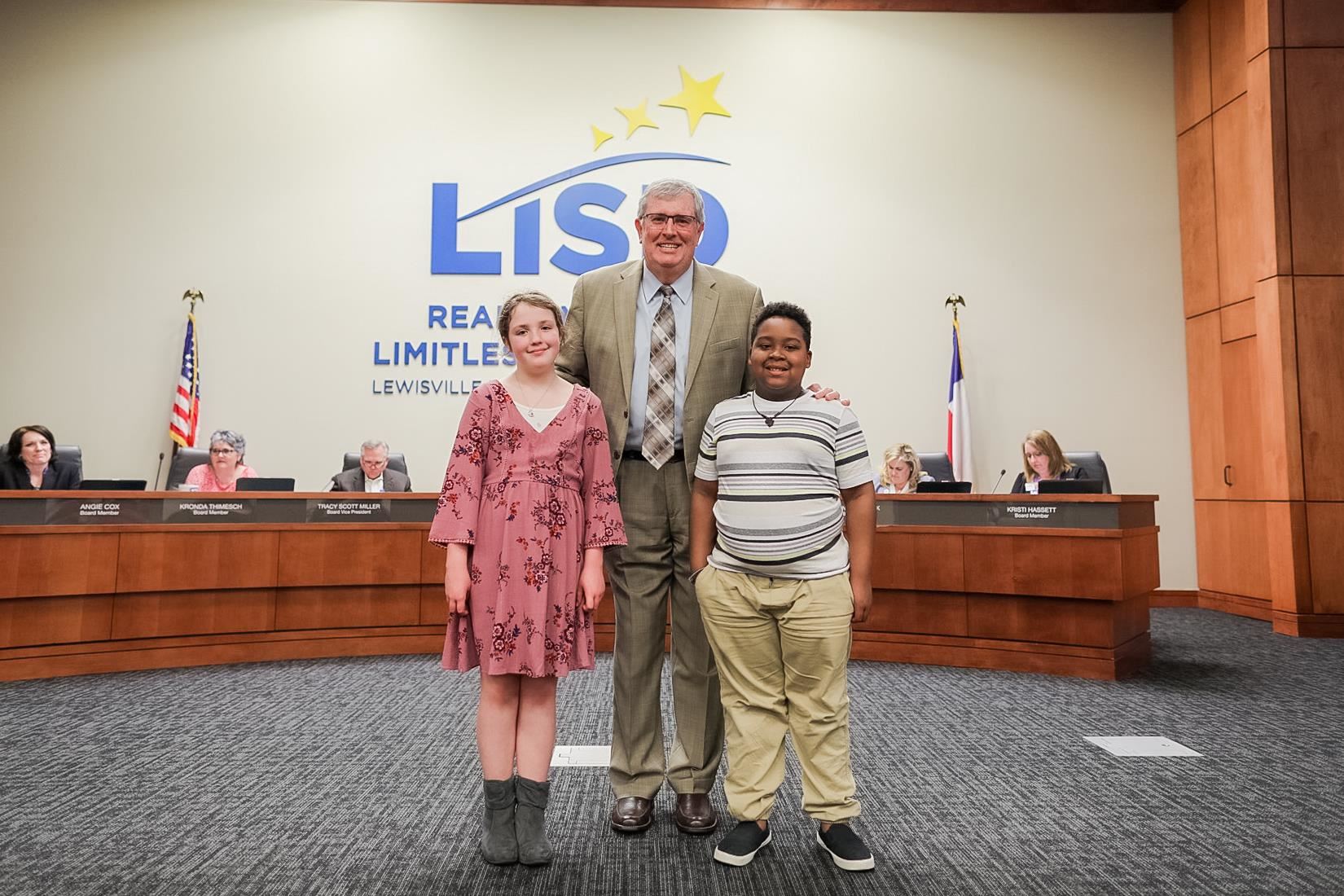 Lewisville Elementary students pose with LISD Superintendent Dr. Kevin Rogers.  