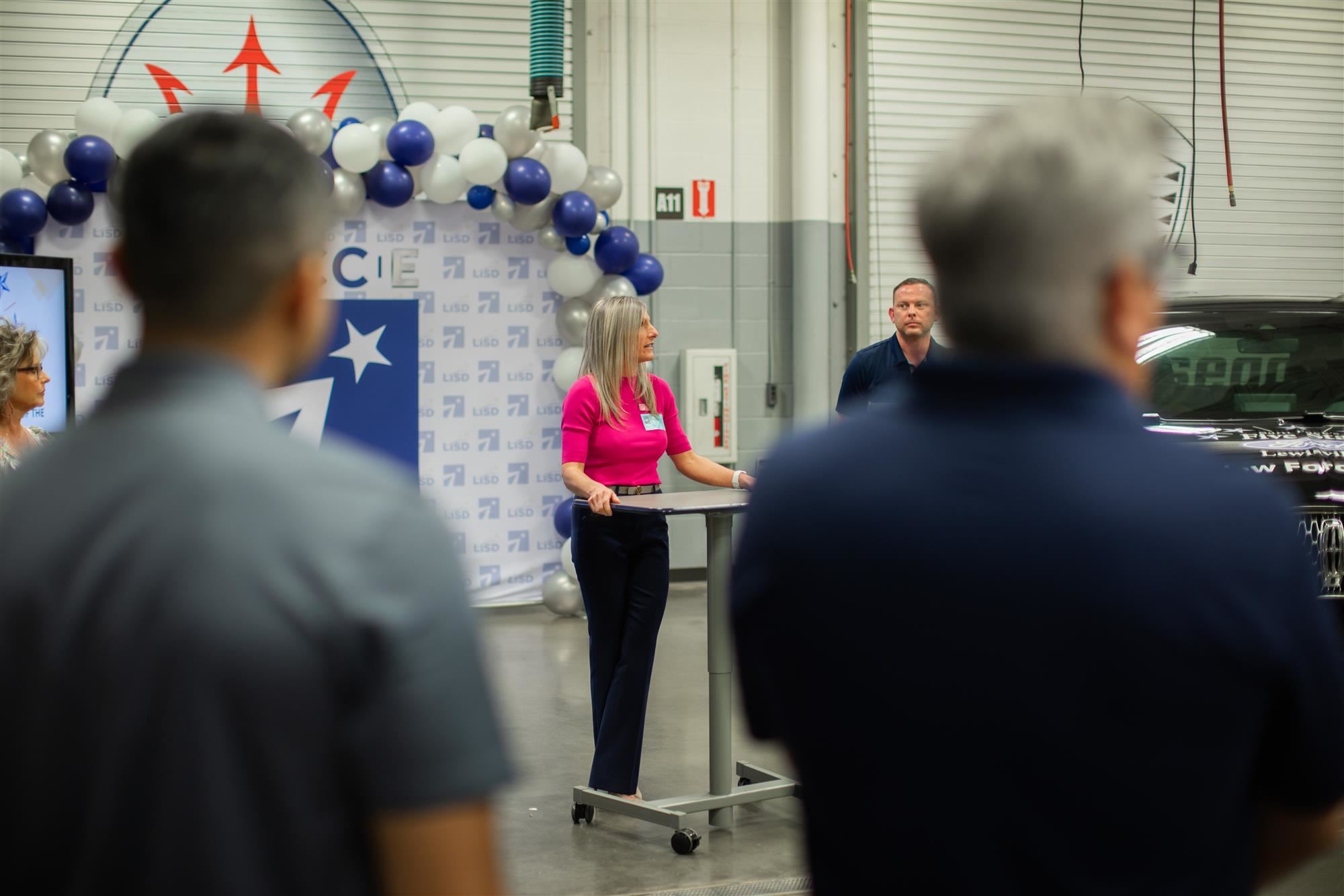 Five Star Ford Lewisville's General Manager Andrea Ballard speaks to TECC East automotive tech students. May 2024