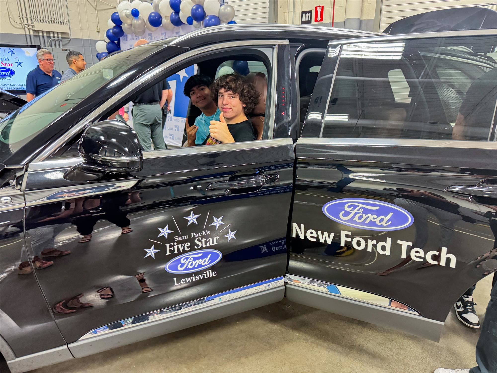 TECC-East students check out the new Lincoln Aviator donated to the school by Ford Motor Company. May 2024