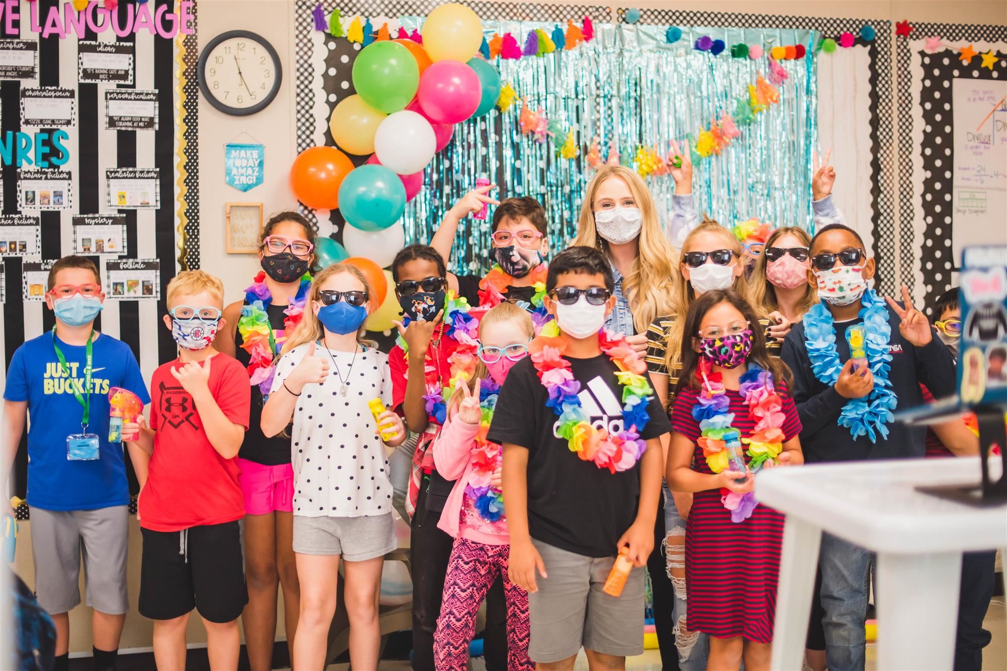 Fairchild's class smiles for group photo in masks 