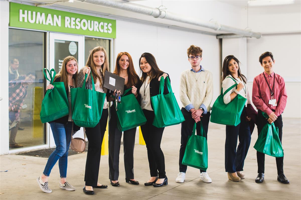 Students visit Nebraska Furniture Mart. 