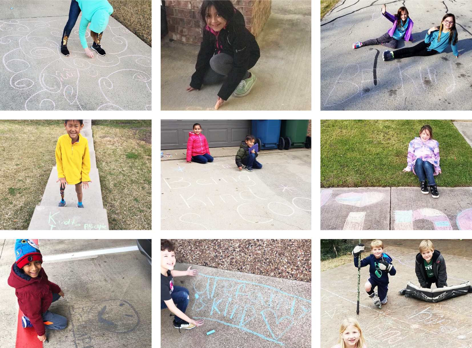 Students smile with their sidewalk chalk creations 