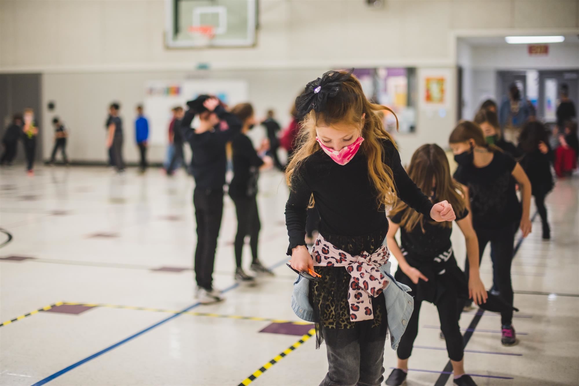 Students doing hopscotch 