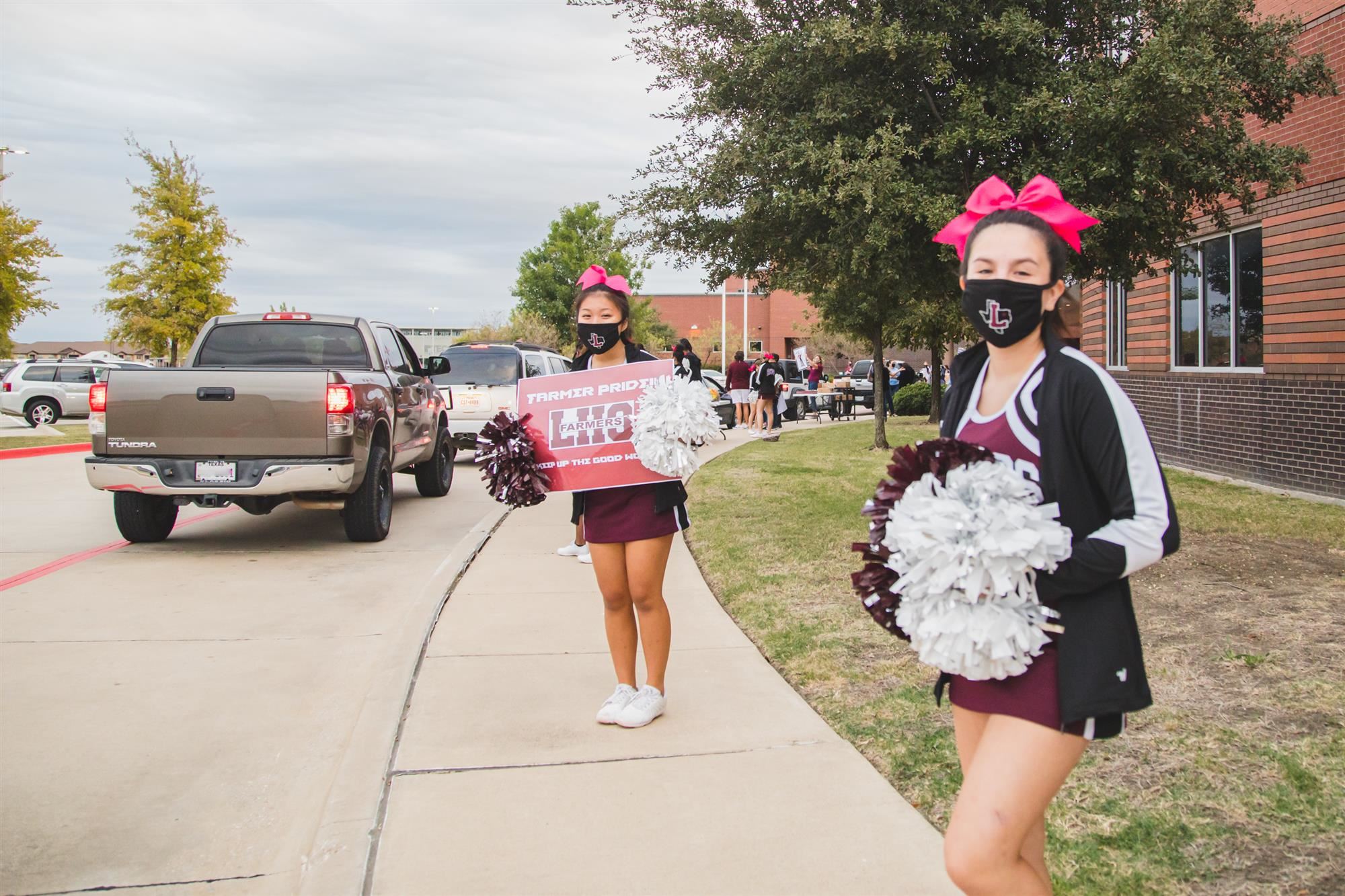 LHS Harmon hosted drive-thru parade for virtual students. 