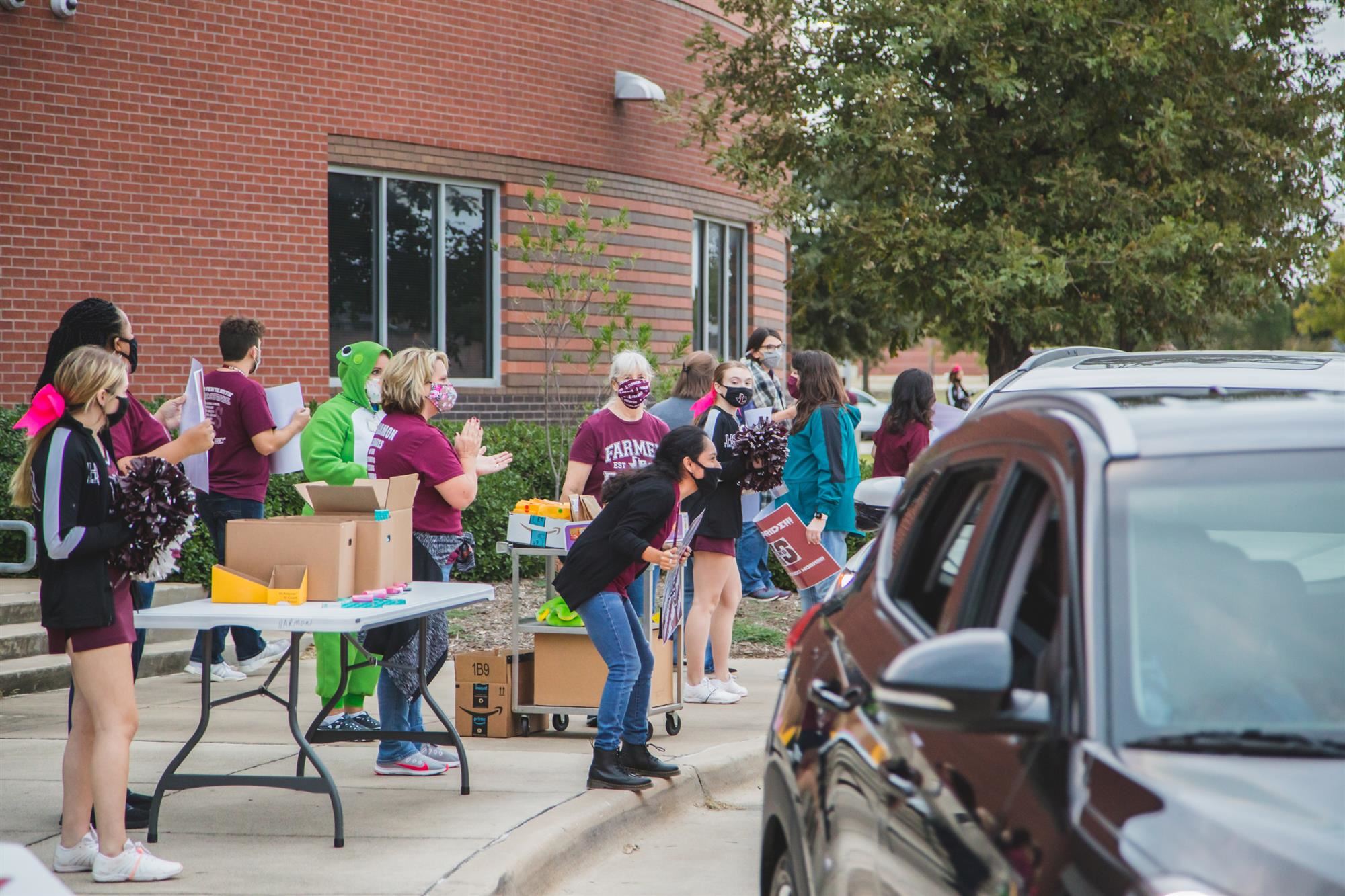 LHS Harmon hosted drive-thru parade for virtual students. 