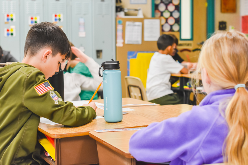students working on poems