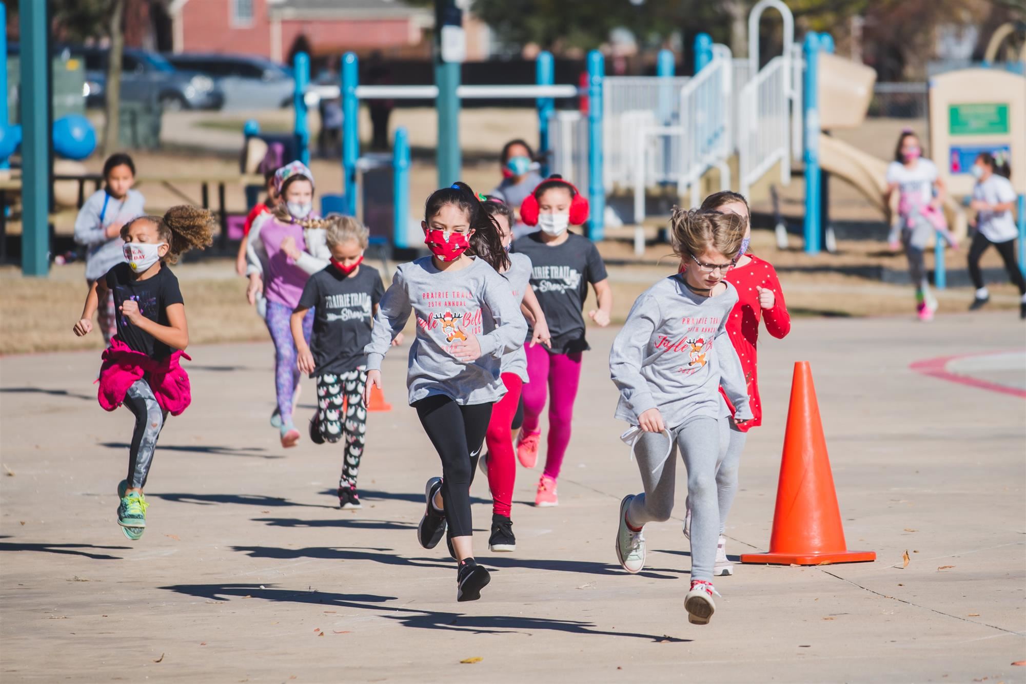 Students run in the Jingle Bell Jog 