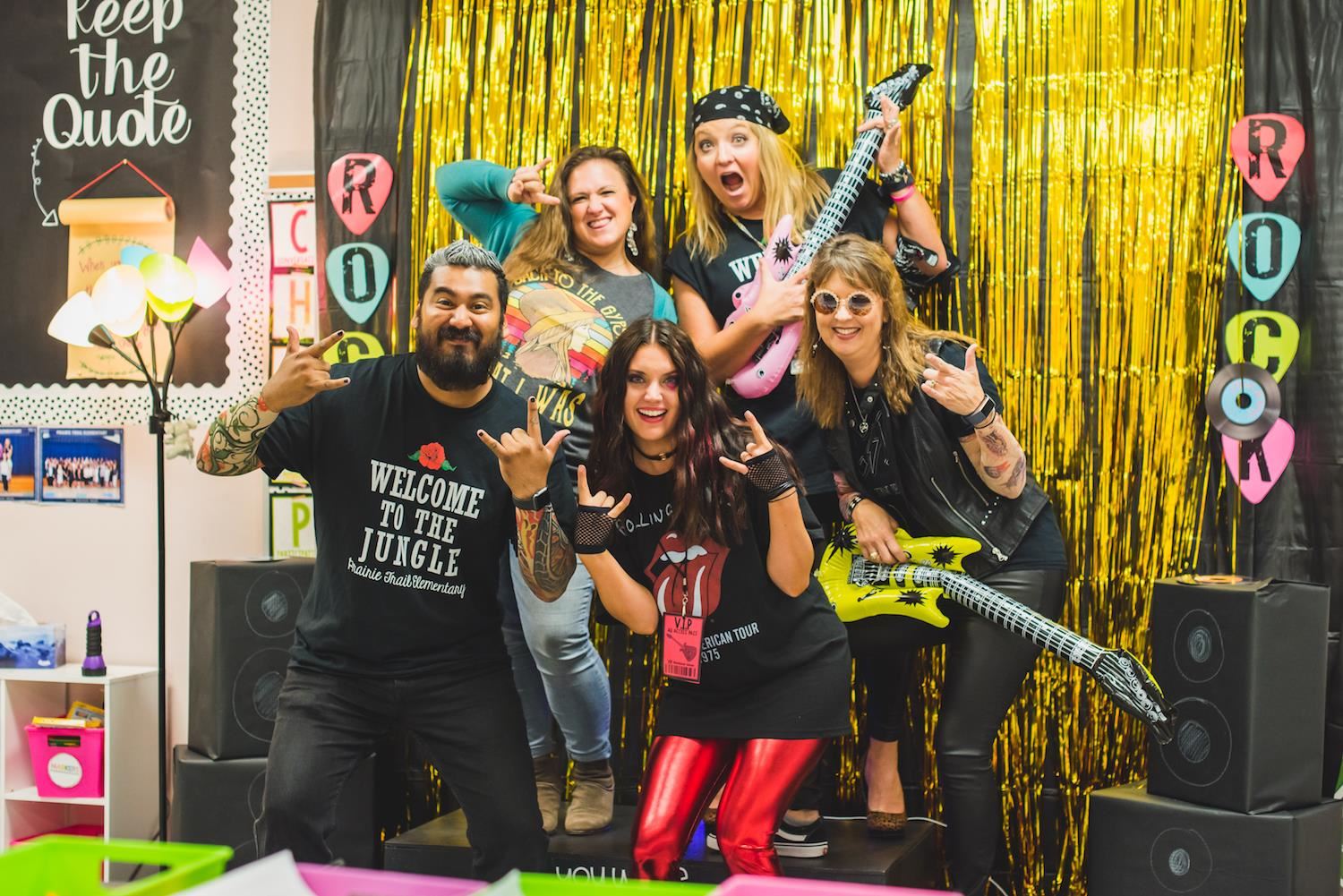 Five teachers dressed as rockstars 