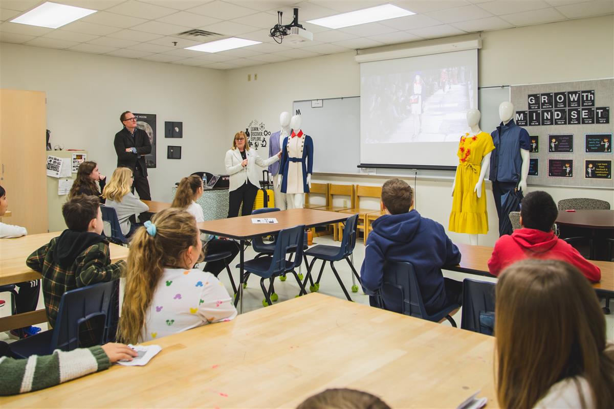 Two guest speakers present at Career Day. 