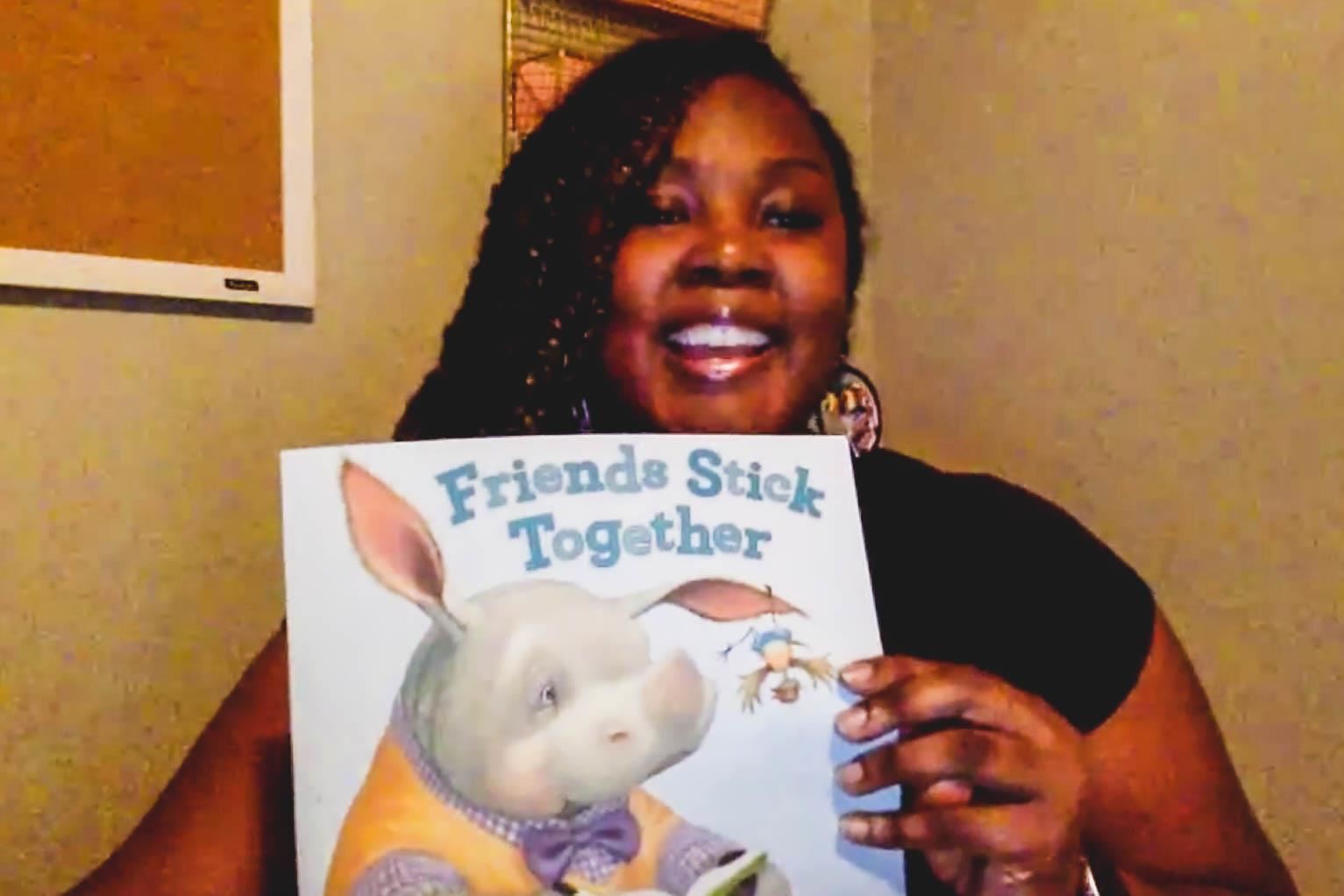 teacher reads book called Friends Stick Together 